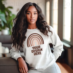 White sweatshirt with black writing 2025