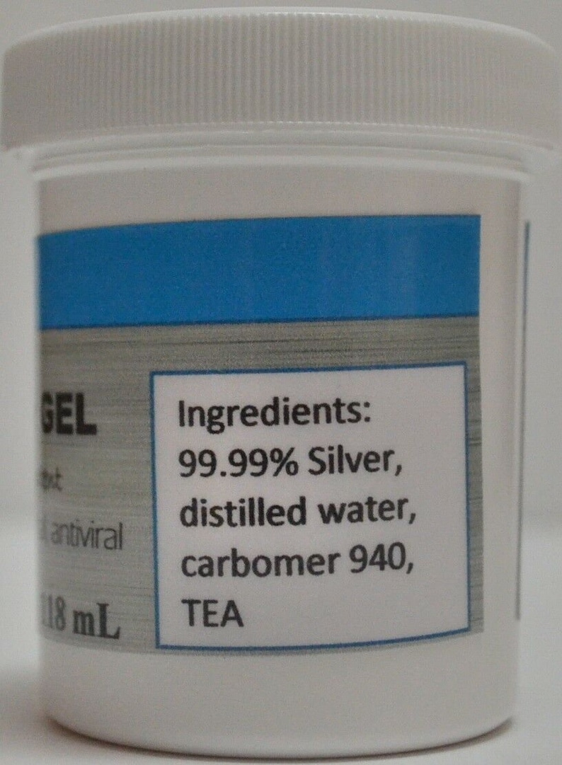 May include: A white plastic bottle with a blue label that reads "GEL" and "Ingredients: 99.99% Silver, distilled water, carbomer 940, TEA". The bottle contains 118 mL of liquid.