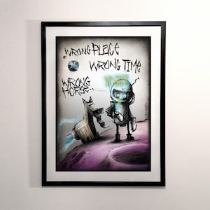 May include: A black and white illustration of a robot and a horse on a purple planet. The robot is wearing a helmet with a blue visor and holding a small object in its hand. The horse is standing on its hind legs and has a long tail. The text "WRONG PLACE WRONG TIME WRONG HORSE..." is written in black and white graffiti style above the robot and horse.