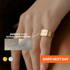 May include: A gold signet ring with a square top engraved with a handwritten signature. The ring is on a person's finger. The image also shows a sample signature and the text "ENGRAVE YOUR ACTUAL HANDWRITING".