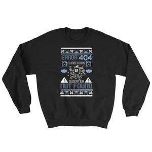 May include: Black Christmas sweater with a blue and white pixelated design. The sweater features the text "ERROR 404 CHRISTMAS SWEATER NOT FOUND".