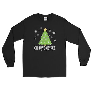 May include: Black long-sleeve t-shirt with a green Christmas tree with eyes for ornaments. The text "OH OPTOMTREE" is printed below the tree.