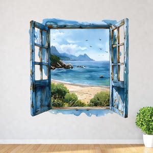 Puede incluir: Pintura a la acuarela de una ventana azul abierta con vistas a una playa. El marco de la ventana es envejecido, con el océano, las montañas y el cielo visibles. Se ven pájaros volando a lo lejos.
