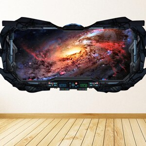 Puede incluir: Una ventana de nave espacial negra con vista a una galaxia colorida con nebulosas giratorias y estrellas.