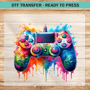 May include: A colorful, abstract design of a video game controller with a white background. The controller is painted with vibrant colors and has a watercolor effect.