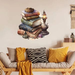 May include: A stack of antique books with leather-bound covers in various colors, including red, green, and blue. A vintage oil lamp with a lit flame sits beside the books. A small lantern and a few decorative items are also present.
