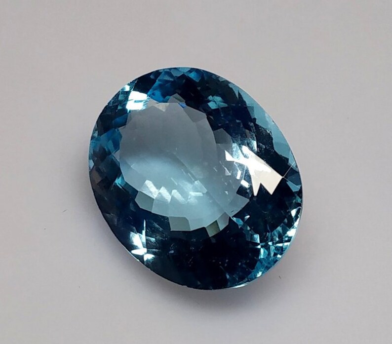 28 Cts 1 Pcs Lot Blue Topaz Oval Cut,Blue Topaz Faceted Cut Cabochon Size 22x18 MM Blue Topaz Faceted Stone,Blue Topaz Loose Gemstone.