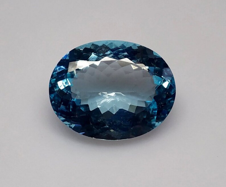 28 Cts 1 Pcs Lot Blue Topaz Oval Cut,Blue Topaz Faceted Cut Cabochon Size 22x18 MM Blue Topaz Faceted Stone,Blue Topaz Loose Gemstone.