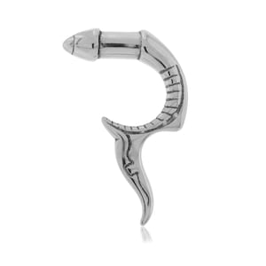 May include: A silver-colored, curved metal object with a rounded tip and a curved body. The object has a series of parallel lines along the inside curve and a decorative, pointed end. The design is reminiscent of a stylized tool or sculpture.