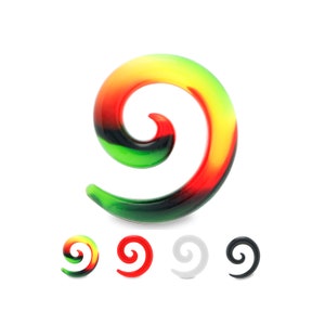 May include: A vibrant ear gauge spiral in green, yellow, and red. Smaller versions in red, white, black, and the same colour pattern are shown below. The spiral design is a popular body modification accessory.