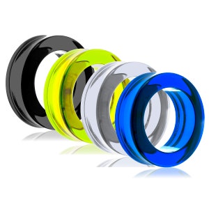 May include: Four colorful, circular ear gauges in black, neon yellow, silver, and blue. The gauges are made of a glossy material and are arranged in a row, with a white background.