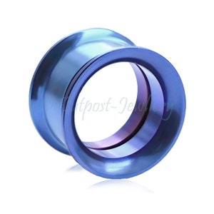 Peut inclure: Un bijou de piercing d'oreille en forme de tunnel bleu. Le bijou est fait d'un matériau métallique brillant. Le tunnel a un design évasé avec une surface lisse et polie. L'intérieur du tunnel est d'une nuance de bleu plus claire.