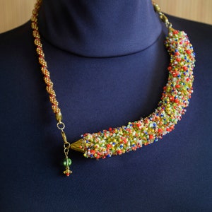 Necklace transforming to the bracelet. Handmade of Czech glass beads in beaded fur technique.