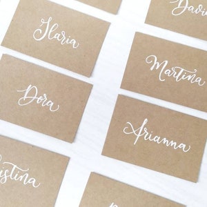 Segnaposti,segnaposto in carta kraft,segnaposti matrimonio,matrimonio rustico,tag matrimonio,nomi invitati,cena,nomi scritti a mano