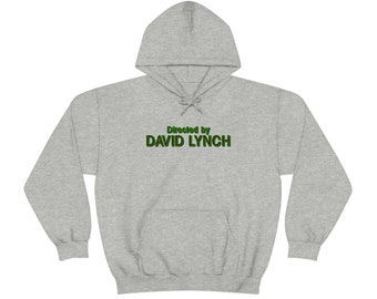 May include: A gray hooded sweatshirt with the text "Directed by DAVID LYNCH" in green outlined letters.