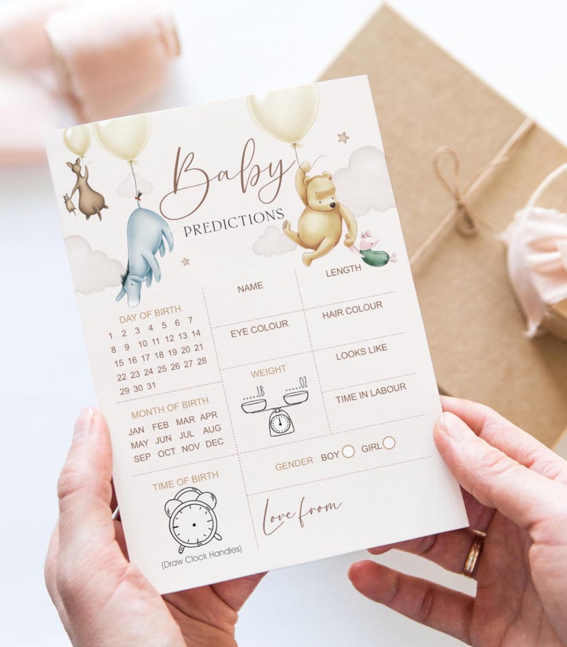 Puede incluir: Tarjeta de predicci&oacute;n para baby shower de color crema con las palabras "Baby Predictions" en escritura elegante. La tarjeta presenta ilustraciones de personajes de Winnie the Pooh y globos. Incluye secciones para nombre, color de ojos y peso.