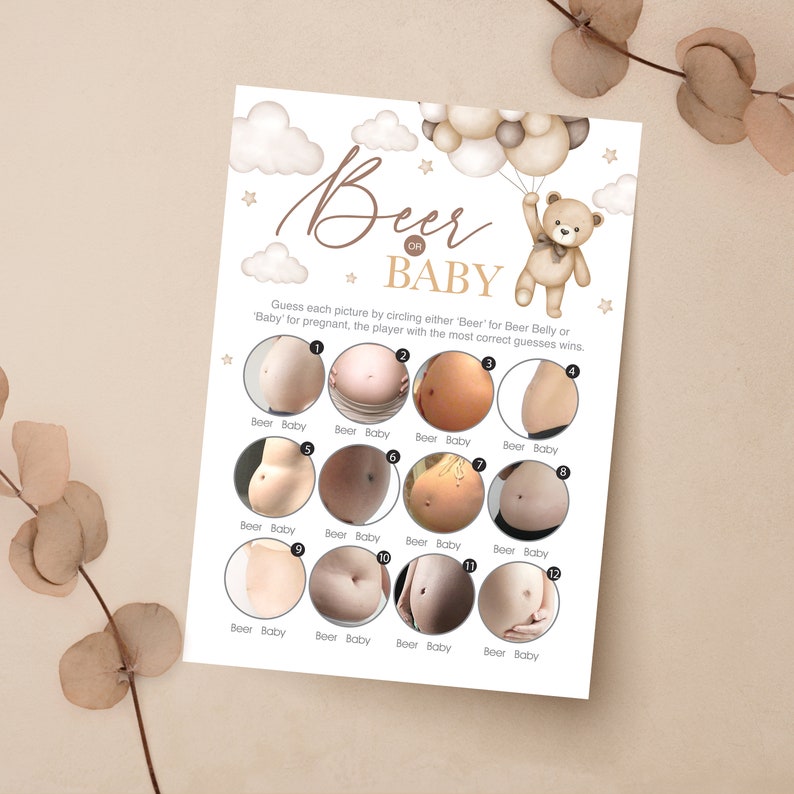 May include: A printable game card with a brown teddy bear holding balloons. The card has a title that says "Beer or Baby" and has 12 images of bellies. Each image has a circle next to it for players to circle "Beer" or "Baby".