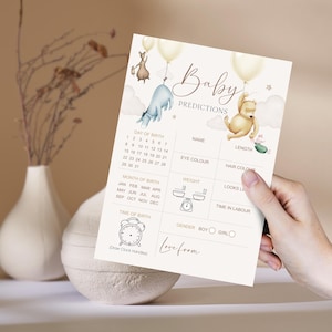 Puede incluir: Tarjeta de predicci&oacute;n para beb&eacute;s beige con ilustraciones de Winnie the Pooh y sus amigos. La tarjeta incluye secciones para el nombre, la longitud, el color de ojos, el color del cabello, el peso y el tiempo de trabajo del beb&eacute;. Tambi&eacute;n tiene una secci&oacute;n para la fecha de nacimiento.