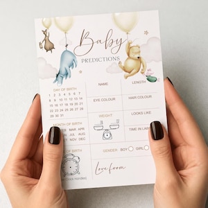 Puede incluir: Una tarjeta de predicci&oacute;n para baby shower con ilustraciones de personajes de Winnie the Pooh y globos. La tarjeta incluye secciones para el nombre, la longitud, el color de ojos, el color del cabello y el peso del beb&eacute;. El texto "Baby Predictions".