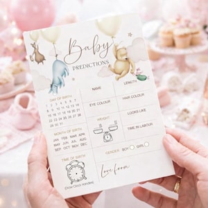 Puede incluir: Una tarjeta de predicci&oacute;n para baby shower con las palabras "Baby Predictions" en la parte superior. La tarjeta presenta ilustraciones de Winnie the Pooh y sus amigos con globos. La tarjeta tiene secciones para el nombre, el color de ojos, el color del cabello y el peso.
