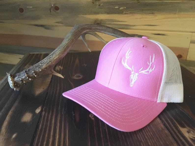 pink and white snapback hat