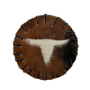 Hair on cowhide coaster.