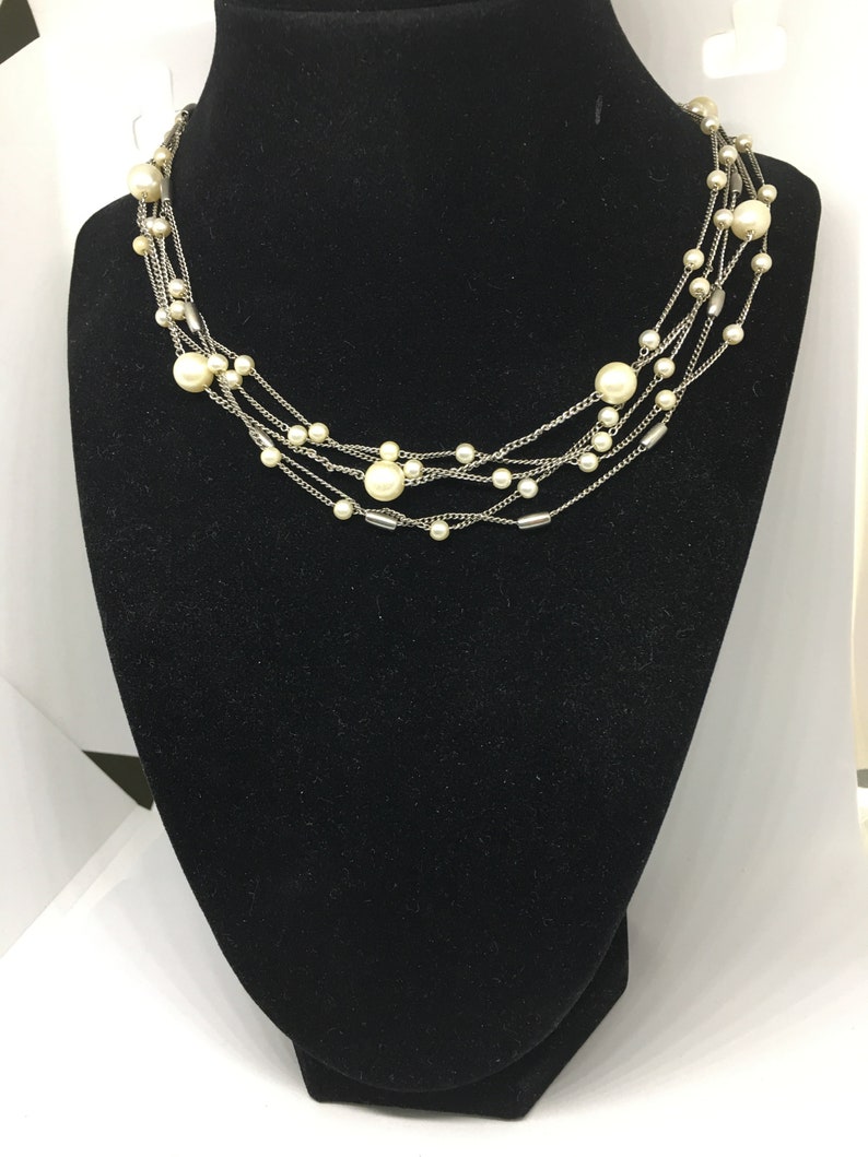 Gift or keep for yourself! Multi-Strand Silver Tone Necklace with faux Pearl and Silver Toned Beads Pearls are big for spring and summer