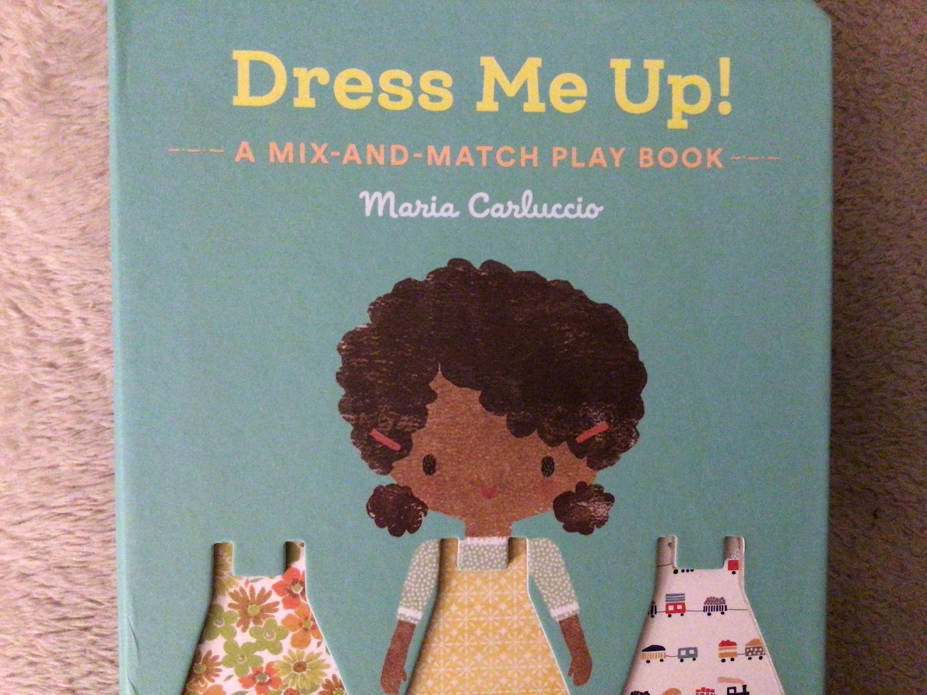 Dress Me Up!: A Mix-and-Match Play Book: 1 : Carluccio, Maria:  : Books