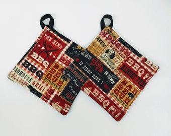 May include: Two red, black, and white pot holders with a BBQ theme. The pot holders feature a variety of text, including "The King of BBQ", "BBQ Forever", and "Weekend BBQ Chef".