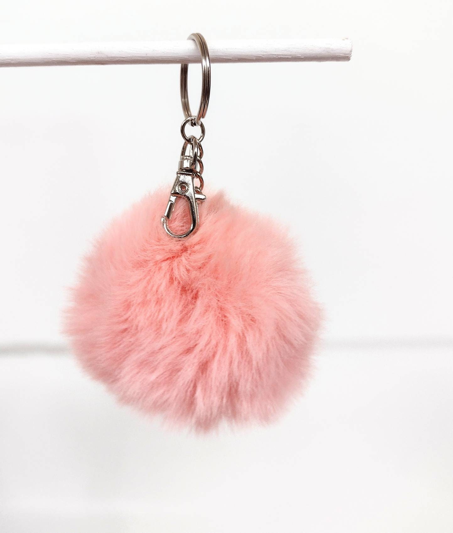 Pink pom pom best sale keyring