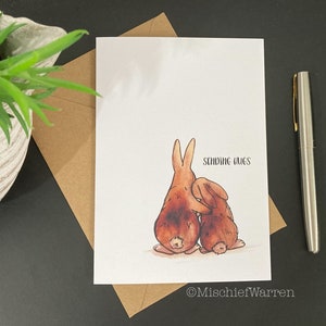 Envoi de câlins ~ carte de lapin ; blanc à l'intérieur. Pour un soutien émotionnel en toute occasion ; divorce, maladie ou condoléances, sympathie pour la perte peut-être.