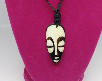 African mask necklace