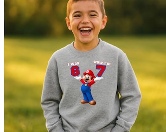 Camiseta de Mario "Tenía seis años, ahora tengo siete" - Sudadera con capucha de cumpleaños para niños de 6 y 7 años - Sudadera divertida para niños - Sudadera con capucha de videojuegos para niños, tallas 2T-X-Large - Camiseta de cumpleaños