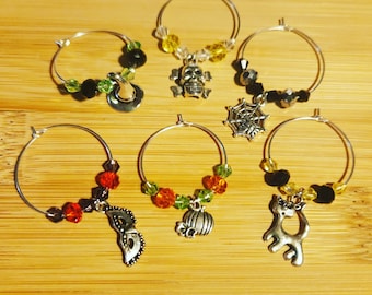 Handmade Halloween Wine Charms Set of 6 with Crystal Beads and Cat, Witch Hat, Pumpkin, Skull and Crossbones, Mask, and Spider Web Charms