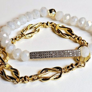 White w/ gold 2pc bracelet set, Easy-on white crystal jeweled bar bracelet, Sacred Stainless gold bracelet w/ clasp, Devine Connection