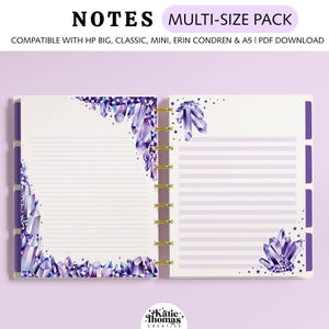 May include: Open notebook with lined pages and a gold spiral binding. The pages are decorated with watercolor crystals in shades of purple and white. The text at the top says "NOTES MULTI-SIZE PACK".