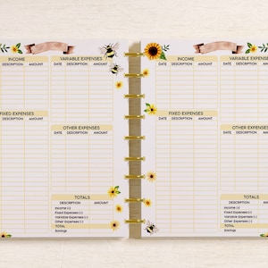 May include: A printable budget planner with a sunflower and bee theme. The planner includes sections for income, variable expenses, fixed expenses, and other expenses. It also has a totals section for calculating income and expenses.