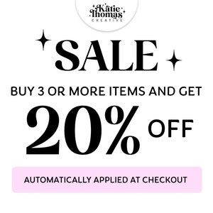 May include: A black and white graphic with the text "SALE" in bold, surrounded by stars. The text "BUY 3 OR MORE ITEMS AND GET 20% OFF" is below the word "SALE". A pink button with the text "AUTOMATICALLY APPLIED AT CHECKOUT" is at the bottom of the graphic.