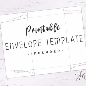 May include: A white printable envelope template with the words "Printable ENVELOPE TEMPLATE - INCLUDED -" in black. Dotted lines and arrows indicate where to cut. The template is on a white wooden surface.