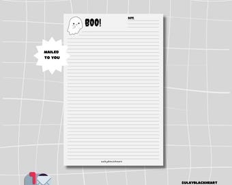 May include: A white lined notepad with a ghost illustration and the word "BOO!". The notepad has the text "MAILED TO YOU" on a starburst and the dimensions 5.5" x 8.5". The notepad has 50 sheets.