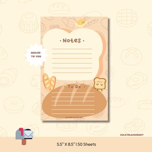 May include: A notepad with a bread theme. The notepad has a light brown background with bread illustrations. It features a "Notes" section and a "To Do" section. The notepad is 5.5" x 8.5" and has 50 sheets. The text "MAILED TO YOU" is also present.