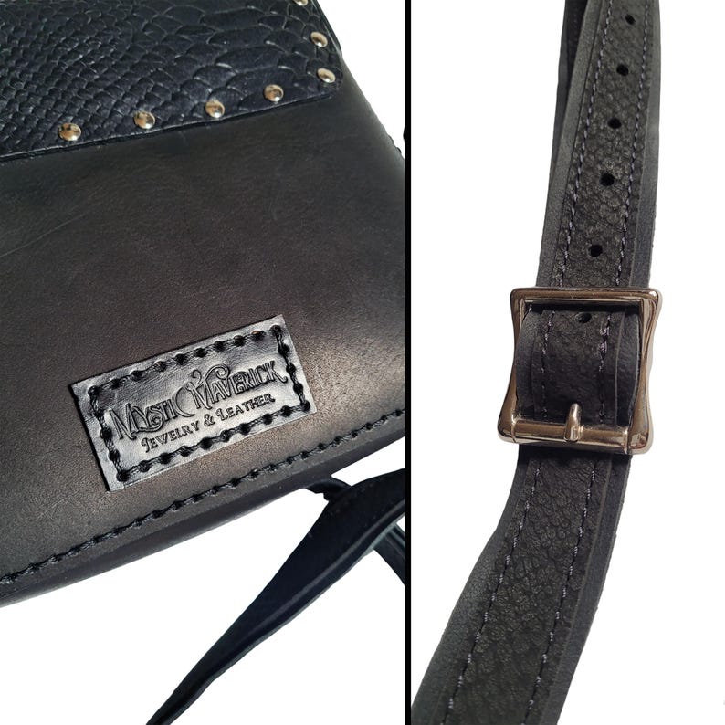May include: Black leather crossbody bag with a silver buckle and a silver studded flap. The bag has a black leather strap and a logo that reads "Mystic Maverick Jewelry & Leather".