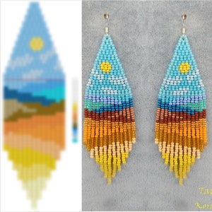 May include: A pair of long, beaded earrings with a colorful landscape design. The earrings are made with small, colorful beads and feature a blue sky, white clouds, a yellow sun, and a multi-colored landscape.