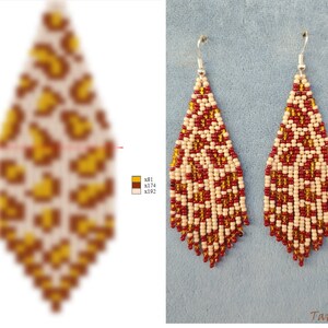 May include: A pair of long, beaded earrings with a leopard print design. The earrings are made with small, white, red, and gold beads. The earrings are hanging from silver hooks.