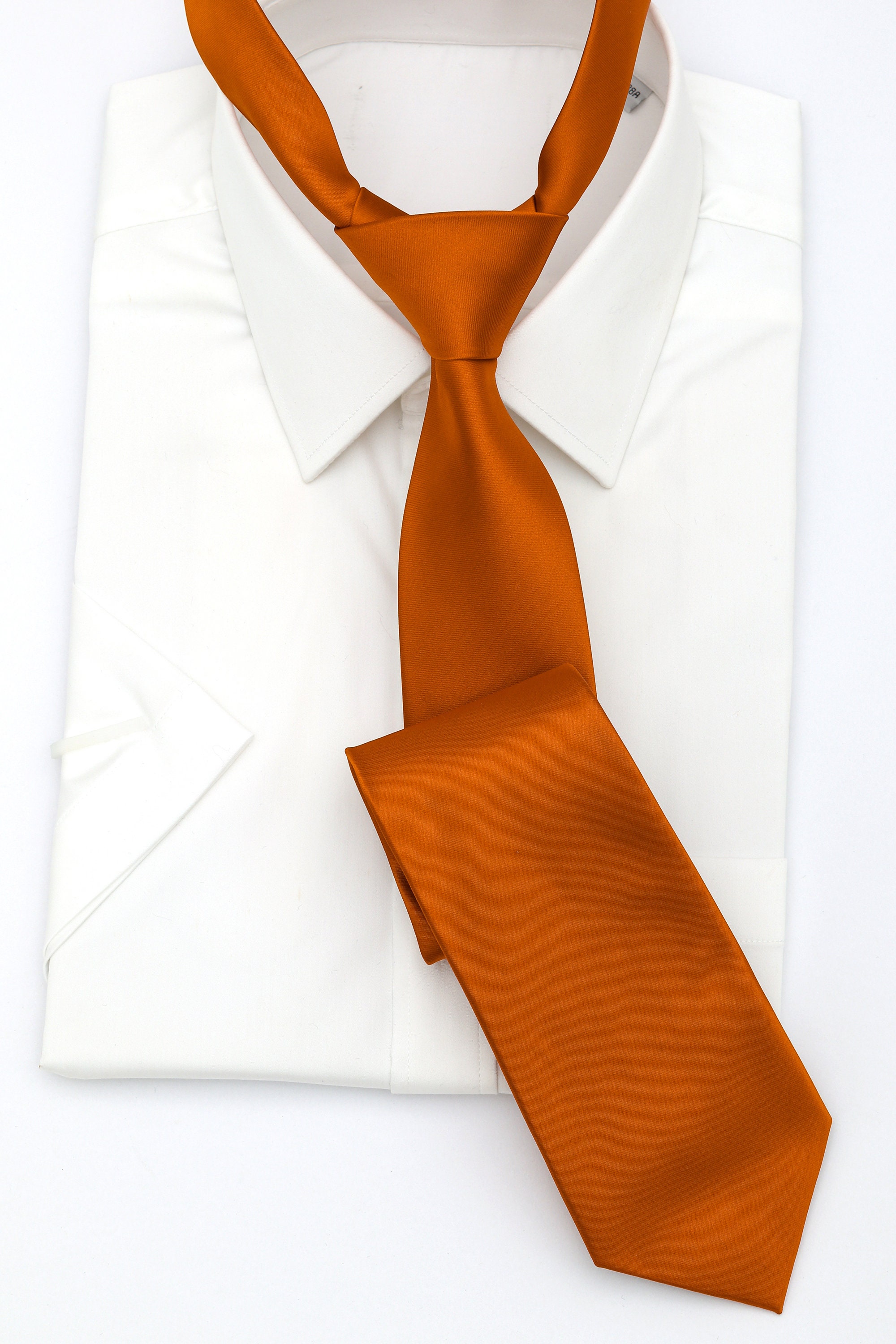 White shirt cheap orange tie
