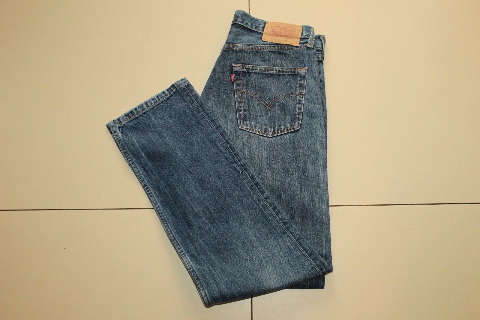 Image of Vintage Men's Blue Denim Levi's 590 Button Stonewashed Tapered Western Jeans W 33 L 32