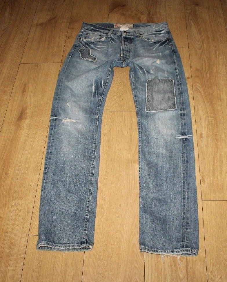 Image of Vintage Men's Blue Denim Vailent Button Patch Distressed Straight Leg Jeans Size 31 L 34
