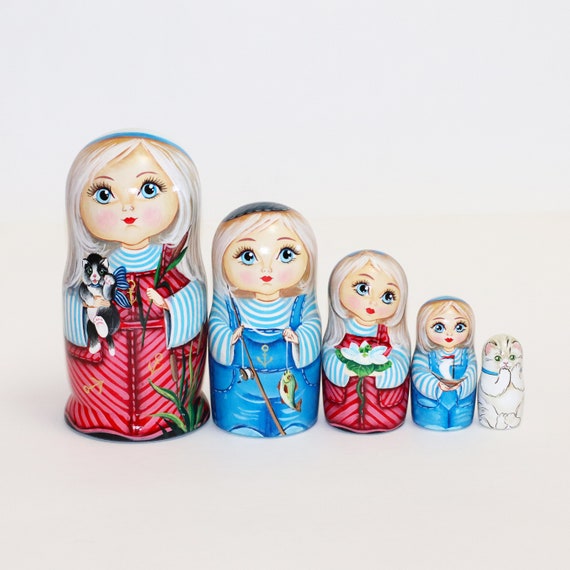 Beautiful nesting dolls Russian girls with spring flowers signed matryoshka Beautiful nesting dolls Russian girls with spring flowers signed matryoshka