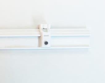 Deslizador para riel o soporte de panel, deslizador de plástico blanco con tornillo, 1 unidad