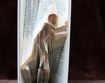 PUSHING MAN Folded book,book holder,Book art,Unique gift, Paper art,Real handmade,One-of-a-kind,Birthday,recycled art, Unique sculpture,